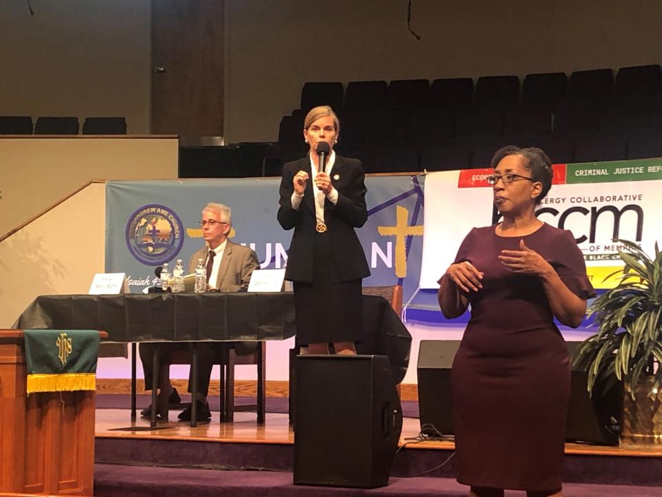Shelby County District Attorney General Amy Weirich, center, speaks during a debate for Shelby County District Attorney General at St. Andrew AME Church Monday, June 27, 2022.