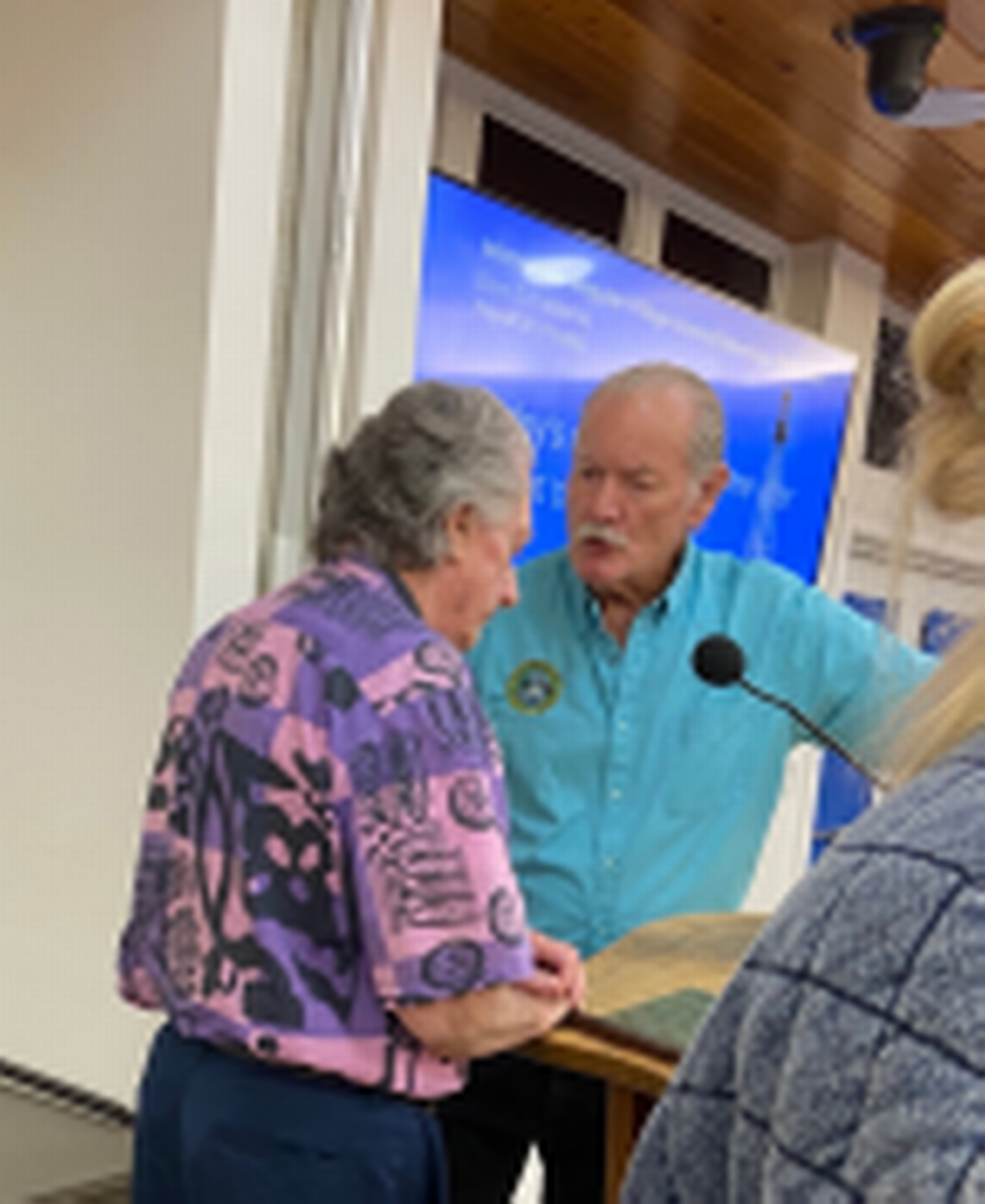 Islamorada Village Councilman David Webb speaks to Vice Mayor Henry Rosenthal while on break during a Thursday, Aug. 25, 2022, meeting where a vote was taken to increase annual garbage collection assessments.