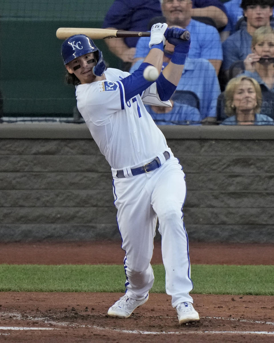 Kansas City Royals shortstop Bobby Witt Jr. hits an RBI single during the third inning of a baseball game against the Cincinnati Reds Wednesday, June 14, 2023, in Kansas City, Mo. (AP Photo/Charlie Riedel)