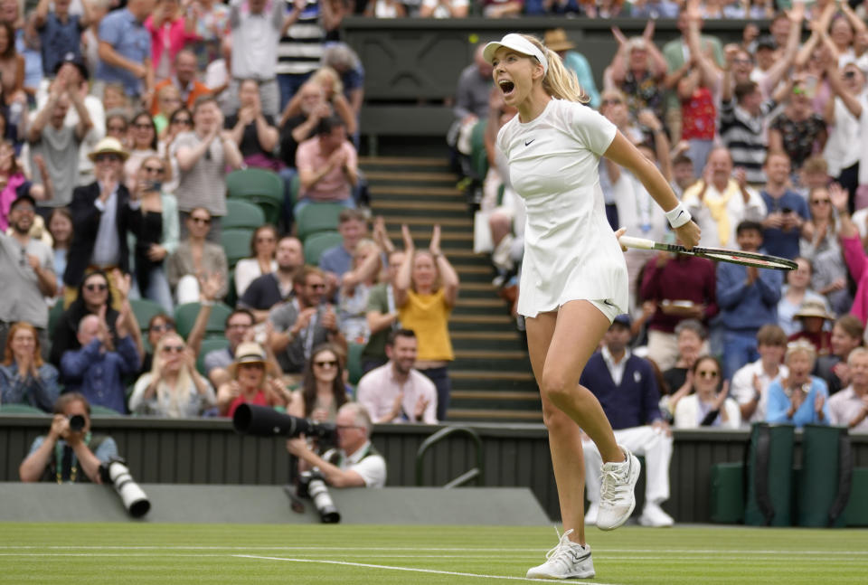 Britain's Katie Boulter celebrates after beating Karolina Pliskova of the Czech Republic in a second round women's singles match on day four of the Wimbledon tennis championships in London, Thursday, June 30, 2022. (AP Photo/Kirsty Wigglesworth)