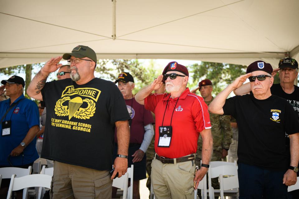 Veterans salute during the National Anthem at the 82nd Airborne Division’s Memorial ceremony on Tuesday, May 21, 2024, on Fort Liberty.