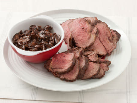 <strong>Get the <a href="http://www.huffingtonpost.com/2011/10/27/beef-tenderloin-aux-poivr_n_1059488.html">Beef Tenderloin Aux Poivre With Brandied Mushroom Sauce</a> recipe</strong>