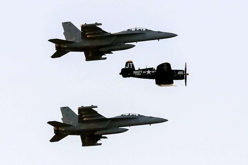 A pair of F-18s and an F-4 fly over Thunder Over Louisville on Saturday, April 23, 2022