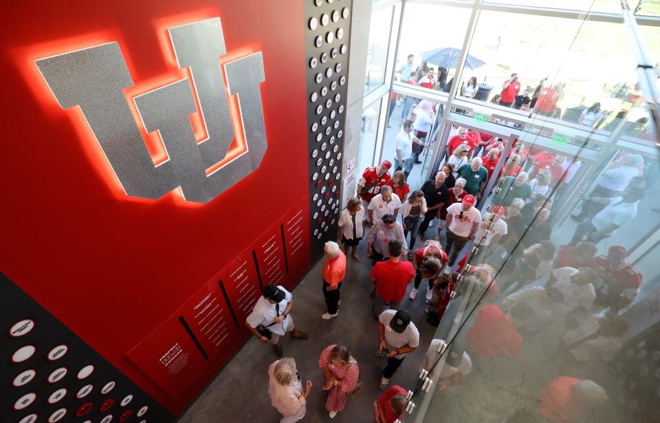 People tour the Dumke Gymnastics Center during a ribbon-cutting event at the University of Utah in Salt Lake City on Thursday, Aug. 17, 2023. | Kristin Murphy, Deseret News