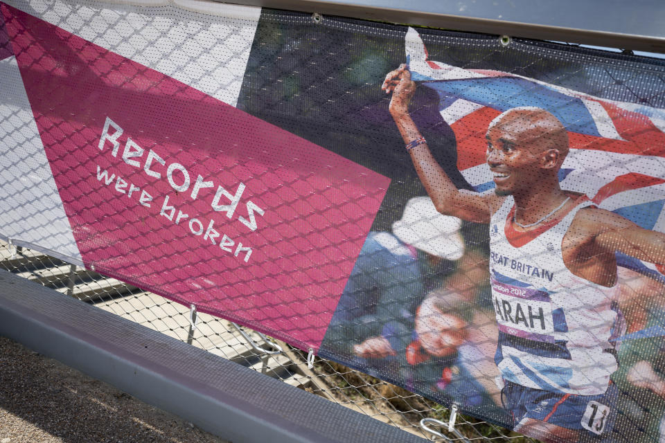 Ten years after the London 2012 Olympics were based here at Stratford, runner and and multi-Gold medalist, Sir Mo Farah appears on banners in The Queen Elizabeth Olympic Park, on 14th June 2022, in London, England. The former main Olympic venue area was controversially re-landscaped from an old industrial estate. Its promised legacy is a green space now known as The Elizabeth Park which remains a wildlife habitat and whose centrepieces are still the Velodrome and Aquatic Centre used by the public while the main Olympic stadium is home to West Ham Football Club. (Photo by Richard Baker / In Pictures via Getty Images)