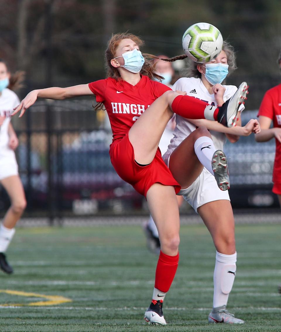 Hingham's Cara Chiappinelli and Pembroke's Emma Cranston vie for the ball during fourth quarter action of their game in the Patriot Cup final at Marshfield High on Saturday, Nov. 21, 2020. 