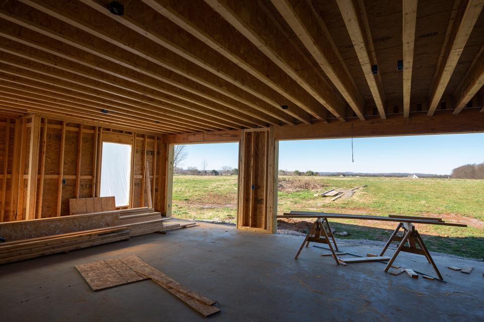 A custom built home constructed by McBroom Home Builders rests uncompleted near Mt. Pleasant, Tenn., due to ongoing supply chain issues caused by the ongoing COVID-19 pandemic on Monday, Jan 10, 2022.