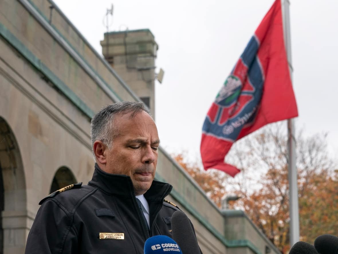 Montreal Fire Chief Richard Liebmann spoke to reporters Monday, after the body of firefighter Pierre Lacroix was recovered from the St. Lawrence River. (Ryan Remiorz/The Canadian Press - image credit)