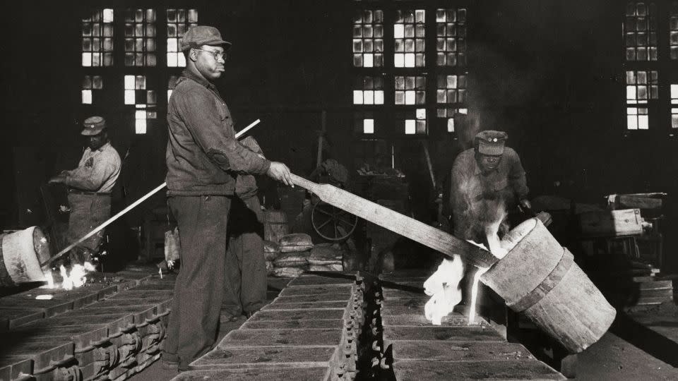 Workers at the American Car and Foundry in St. Louis, Missouri in 1956. - Charles Rotkin/Corbis Historical/Getty Images