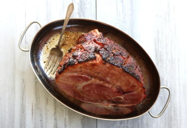 If you buy a ham with the bone, you’ll have a flavourful starting point for a pot of soup, or real baked beans. And don't forget delicious leftovers. (Julie Van Rosendaal/CBC - image credit)