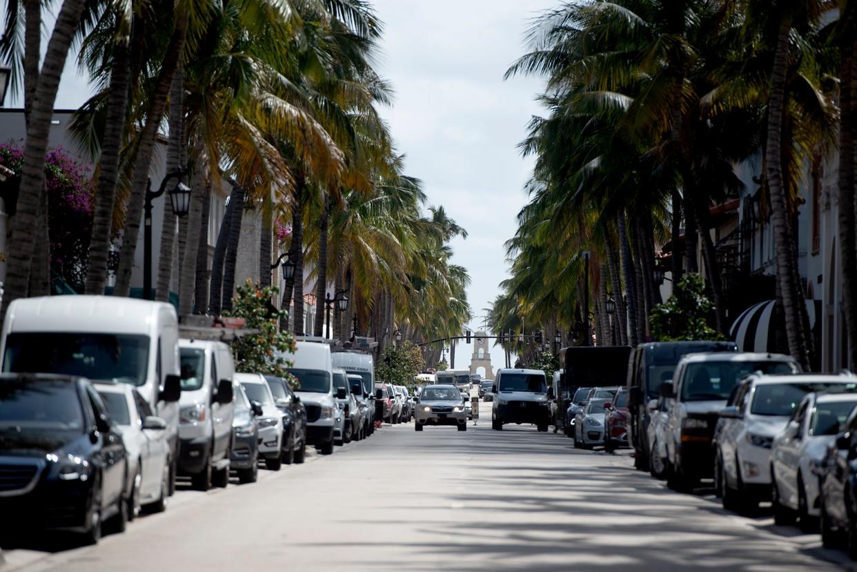 Traffic along Worth Avenue crawls along March 31 as empty parking spaces are scarce. Palm Beach Police issued 2,221 parking citations along the Avenue this season.