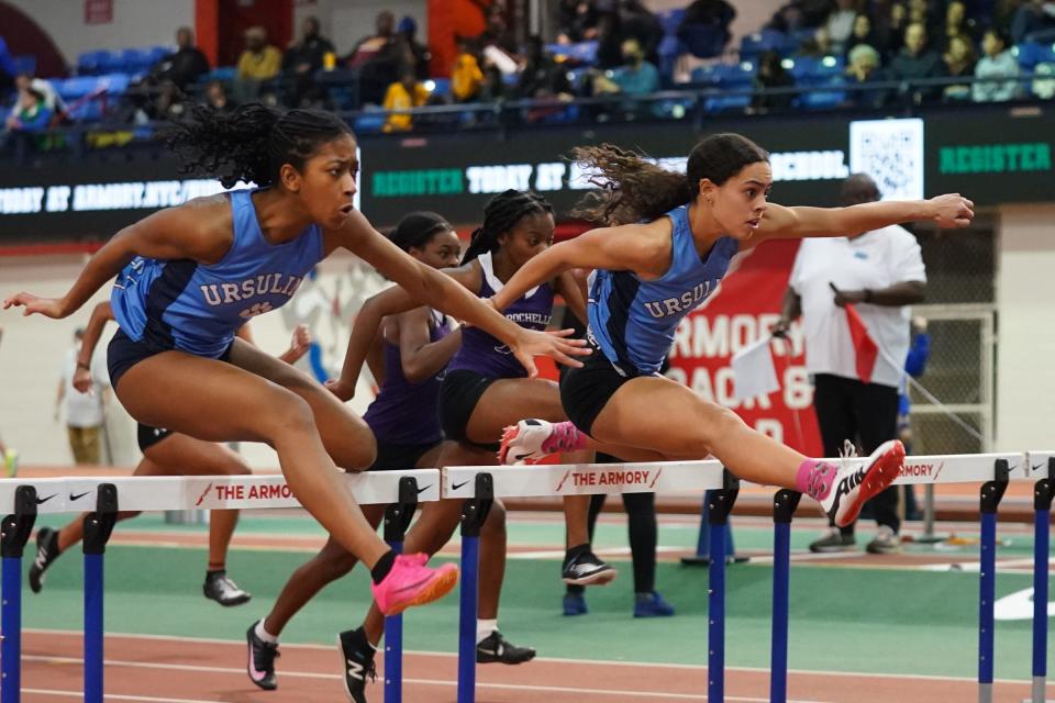 Ursuline's Ivana Richards, left, and Elena Olson run the 55-meter hurdles at the Westchester Co. Track & Field Championships at The Armory. Track & Field Center in New York on Saturday, January 28, 2023.