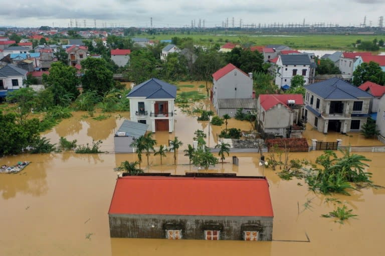 Homes in the Thai Nguyen area are partially submerged in the severe flooding triggered by Typhoon Yagi (Huu Hao)