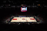 UCLA plays San Diego State in front of empty stands at Viejas Arena during the first half of an NCAA college basketball game Wednesday, Nov. 25, 2020, in San Diego. (AP Photo/Gregory Bull)