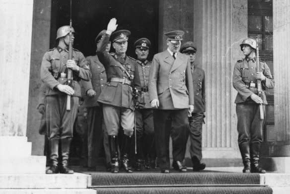 Romanian head of state, Gen. Ian Antonescu (2nd-L) meets with Nazi leader Adolf Hitler (2nd-R) on June 10, 1941. On November 23, 1940, Romania signed the Tripartite Pact, joining the Axis powers of Germany, Italy and Japan in World War II. File Photo courtesy the Germany Federal Archive