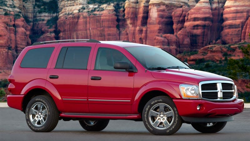 A photo of a red Dodge Durango SUV. 