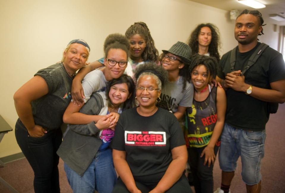 Jazmaire LaTour, left, with team members Miniya Brisbane, Madison Espinoza, Adilia Watson, coach Tama Brisbane, team members Soyini Adams, Anthony Orosco Jr., Breana Thornton and coach Aaron Chapman on Jun. 15, 2016.