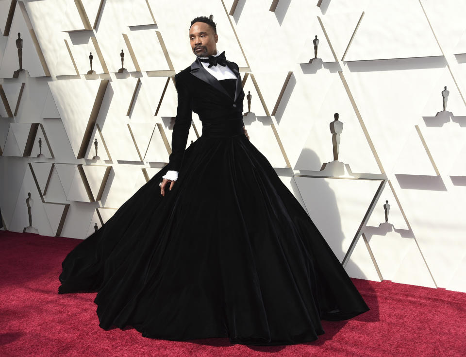 FILE - This Feb. 24, 2019 file photo shows Billy Porter wears a black velvet tuxedo gown by Christian Siriano at the Oscars in Los Angeles. (Photo by Richard Shotwell/Invision/AP, File)