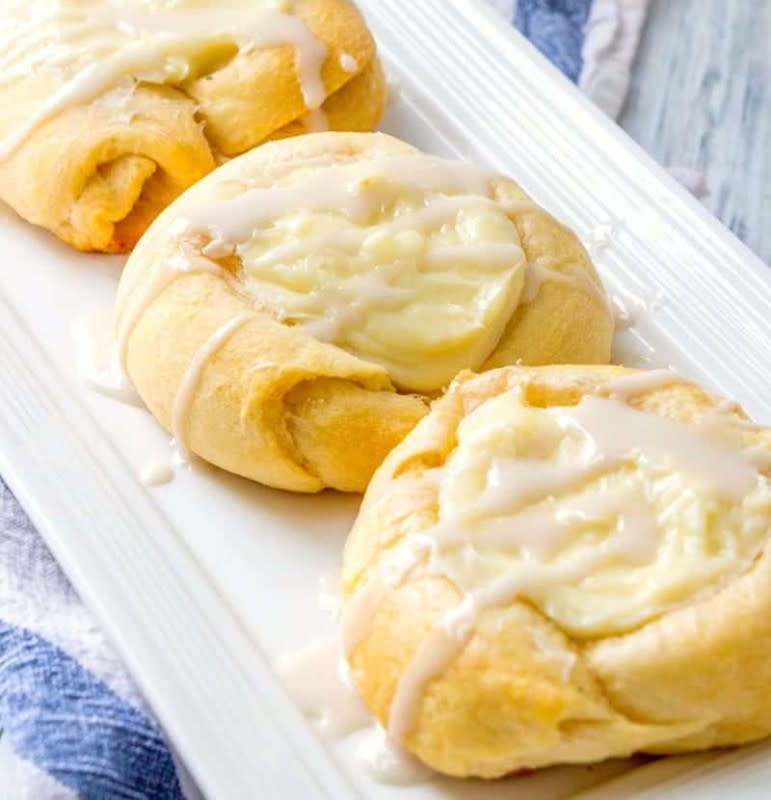 <p>The Country Cook</p><p>A great short-cut recipe for a sweet treat in the morning. Try adding strawberry or raspberry jam for even more flavor.</p><p><strong>Get the recipe: <a href="https://www.thecountrycook.net/crescent-roll-cheese-danishes/" rel="nofollow noopener" target="_blank" data-ylk="slk:Crescent Roll Cheese Danish;elm:context_link;itc:0;sec:content-canvas" class="link ">Crescent Roll Cheese Danish</a></strong></p>