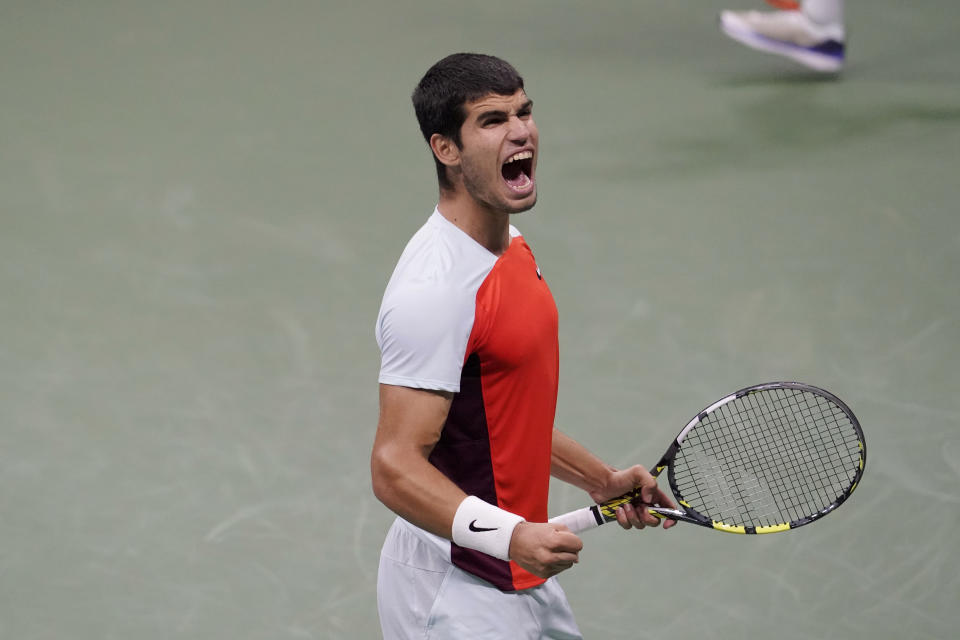 Carlos Alcaraz, of Spain, reacts after scoring a point against Casper Ruud, of Norway, during the men's singles final of the U.S. Open tennis championships, Sunday, Sept. 11, 2022, in New York. (AP Photo/Mary Altaffer)