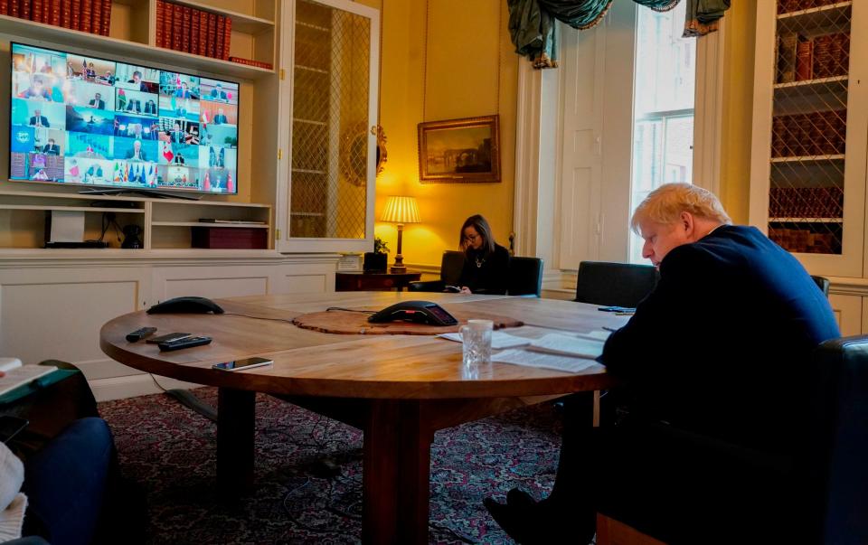 Boris Johnson taking part in a video conference with G20 leaders (10 Downing Street/AFP via Getty)