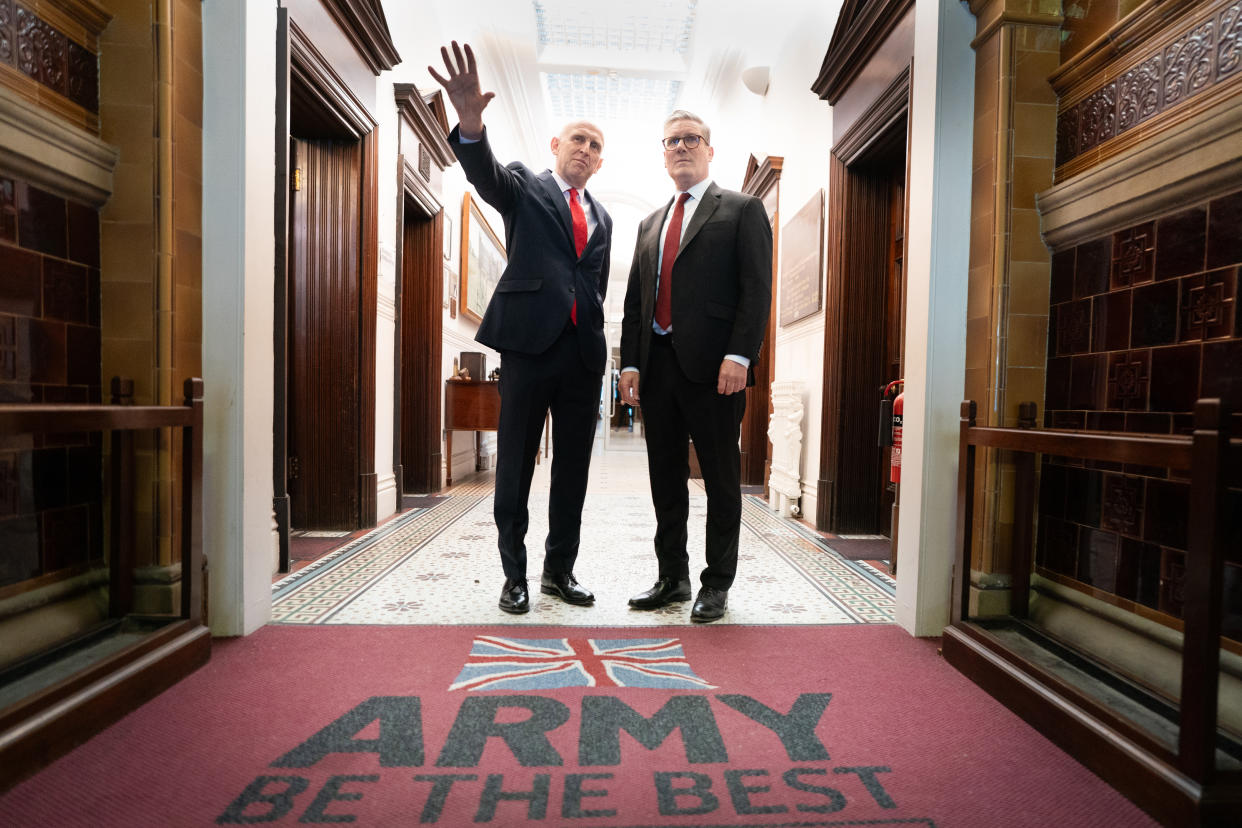 Sir Keir Starmer and shadow defence secretary John Healey prepare for an election battle during a visit to the Fusilier Museum in Bury, Greater Manchester (Stefan Rousseau/PA)