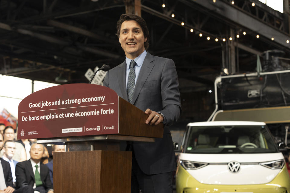 Canada Prime Minister Justin Trudeau makes a Volkswagen electric battery plant announcement at the Elgin County Railway Museum in St. Thomas, Ontario, Friday, April 21, 2023. (Tara Walton/The Canadian Press via AP)