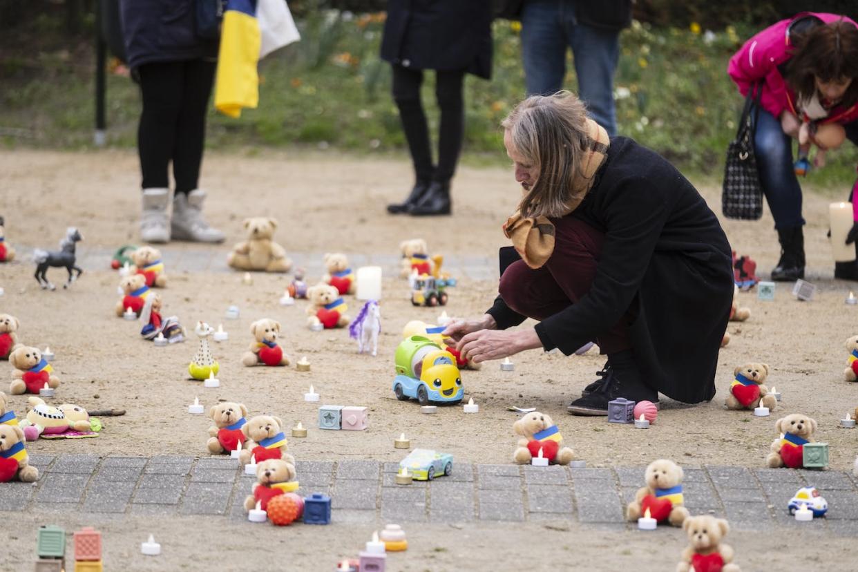 People in Brussels attend a memorial for the Ukrainian children who have been forcibly taken to Russia. <a href="https://media.gettyimages.com/id/1247413833/photo/avaaz-demonstration-for-ukrainian-children-kidnapped-by-russia.jpg?s=1024x1024&w=gi&k=20&c=9h-qz3QRujrOfaZteTqg0aimHxEuSz-EMiTSo_b-6FY=" rel="nofollow noopener" target="_blank" data-ylk="slk:hierry Monasse/Getty Images;elm:context_link;itc:0;sec:content-canvas" class="link ">hierry Monasse/Getty Images</a>