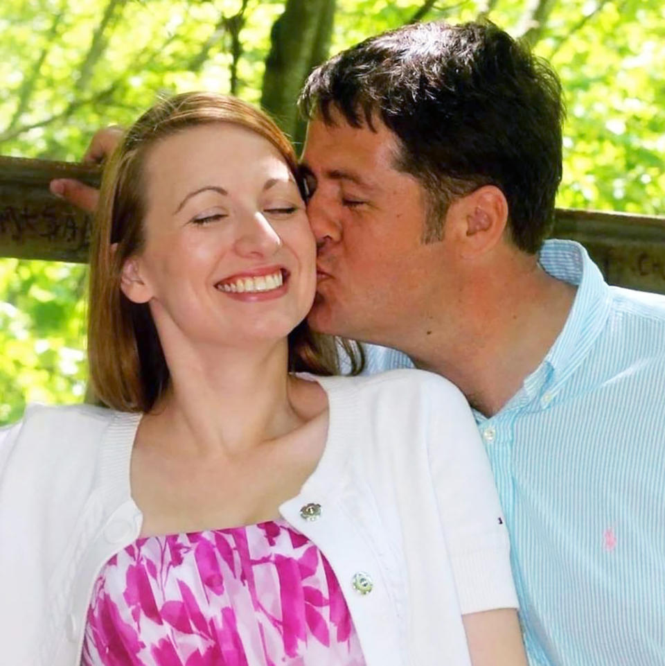 Heather Martell is kissed by her husband, Jason. (Courtesy Heather Martell)