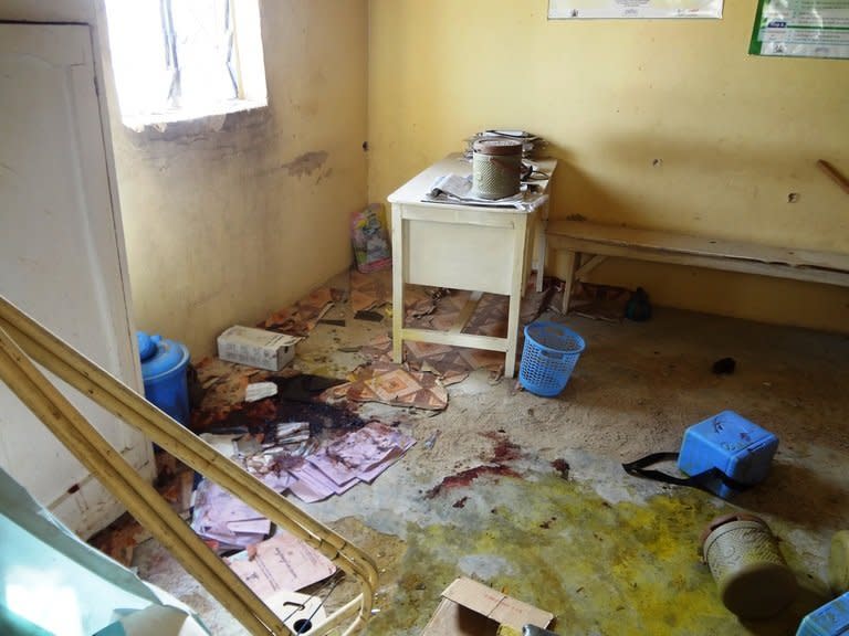 Dried blood stains and abandoned polio vaccine kits litter the floor of Haye dispensary on February 8, 2013 in the northern Nigerian city of Kano. President Goodluck Jonathan condemned the "dastardly terrorist attacks"