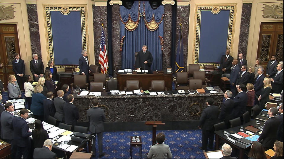 In this image from video, presiding officer Chief Justice of the United States John Roberts arrives for the start of the impeachment trial against President Donald Trump in the Senate at the U.S. Capitol in Washington, Thursday, Jan. 30 2020. (Senate Television via AP)