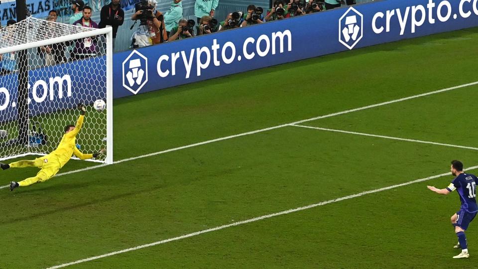 Poland's goalkeeper #01 Wojciech Szczesny (L) saves the penalty shot by Argentina's forward #10 Lionel Messi (top R) during the Qatar 2022 World Cup Group C football match between Poland and Argentina at Stadium 974 in Doha on November 30, 2022. ((Photo by GLYN KIRK/AFP via Getty Images)