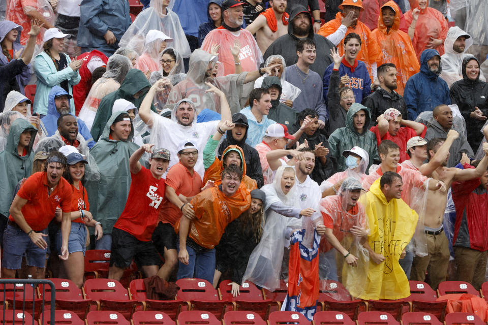 Sam Houston State fans react to a play that was called back against the South Dakota State during the first half of the NCAA college FCS Football Championship in Frisco, Texas, Sunday, May 16, 2021. (AP Photo/Michael Ainsworth)