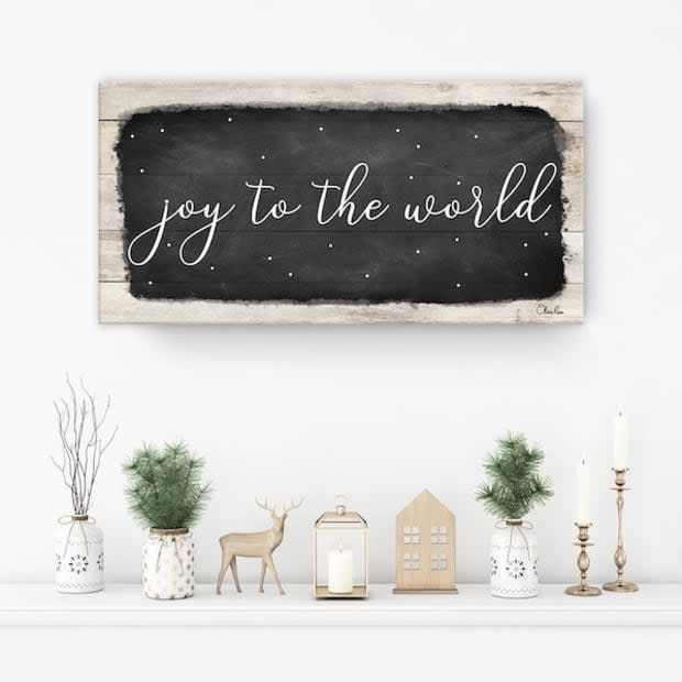 <p>This farmhouse style sign will bring Christmas cheer to any home!</p><p><strong><a href="https://go.skimresources.com?id=113896X1572730&xs=1&url=https%3A%2F%2Fwww.pier1.com%2Fproducts%2Fjoy-to-the-world-small-black-holiday-canvas-wall-art-by-olivia-rose%3Fvariant%3D36673419083943&sref=parade.com%2Fshopping%2Fbest-gifts-under-100" rel="noopener" target="_blank" data-ylk="slk:Joy to the World Canvas, $52.59 at Pier 1;elm:context_link;itc:0;sec:content-canvas" class="link ">Joy to the World Canvas, $52.59 at Pier 1</a></strong></p><p>Pier 1</p>