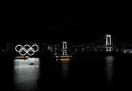 The Wider Image: Postcards from Tokyo: light and shadow ahead of pandemic Olympics