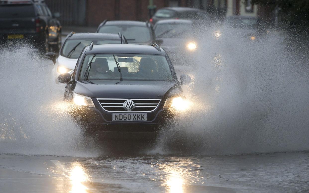 how to drive through floods puddles standing water is it safe uk driving rain aquaplane weather warning