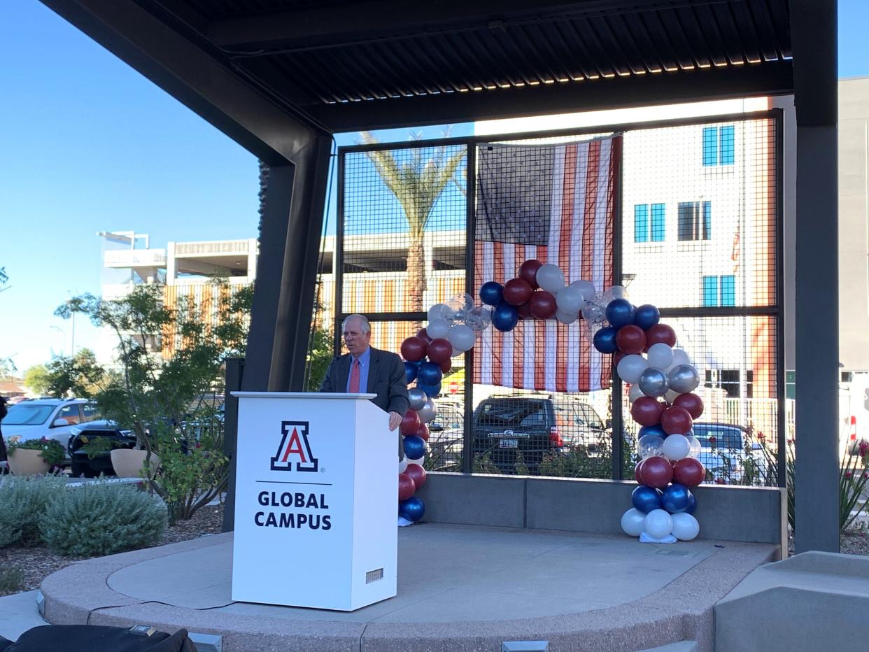 University of Arizona President Robert Robbins gives remarks at a ribbon cutting for University of Arizona Global Campus outside the online college's office in Chandler on Feb. 7, 2022.