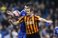 Chelsea's Andreas Christensen (L) challenges Bradford City's James Hanson during their FA Cup fourth round soccer match at Stamford Bridge in London January 24, 2015. REUTERS/Stefan Wermuth (BRITAIN - Tags: SPORT SOCCER)