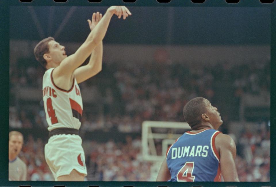 The Trailblazers' Dražen Petrović shoots the ball in front of the Pistons' Joe Dumars during Game 3 of the 1990 NBA Finals at The Memorial Coliseum. Covering Petrović's NBA career was a moment of joy for USA TODAY Sports columnist Mike Freeman.