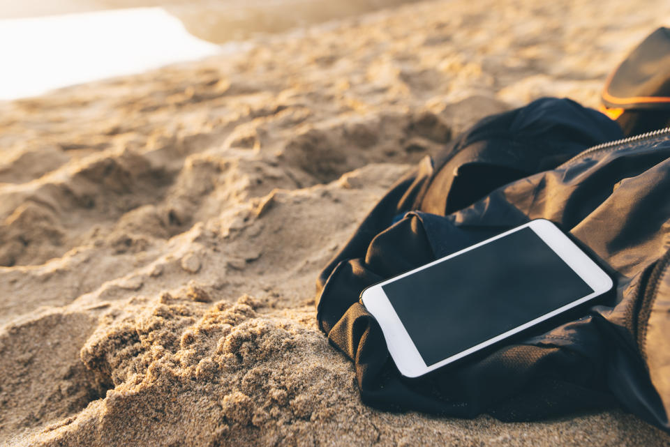 A mobile phone at a beach