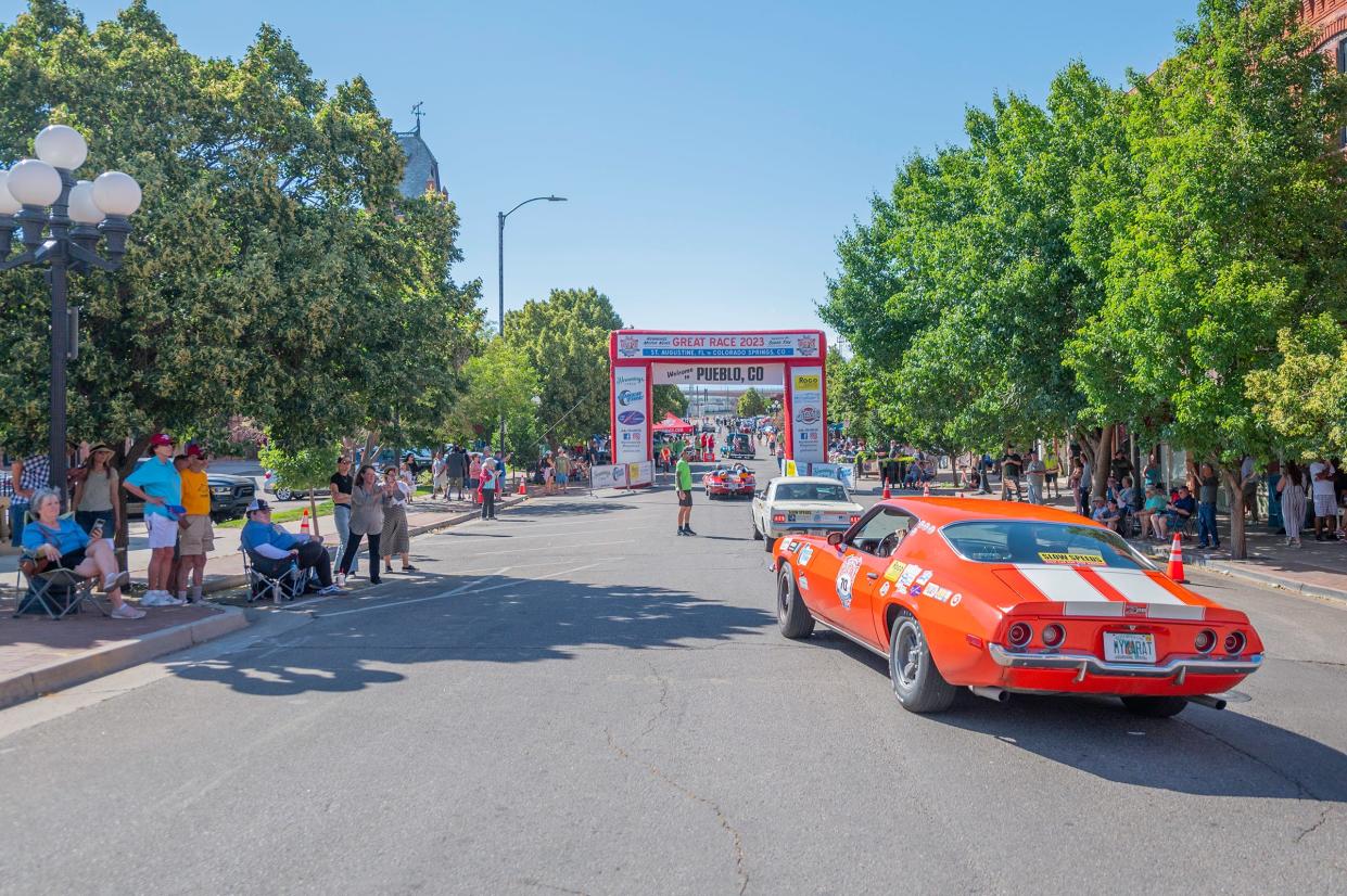 Spectators line B Street as participants are introduced at the 2023 Hemmings Motor News Great Race stop in Pueblo on Saturday.