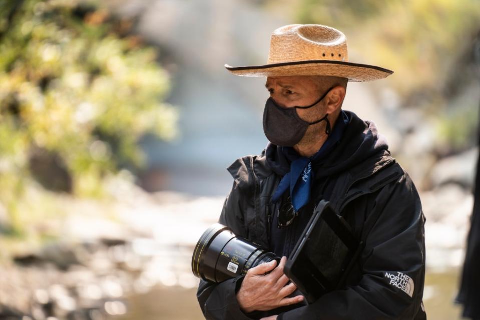 (L-R): Director of Photography Jeff Cutter on the set of 20th Century Studios' PREY, exclusively on Hulu. Photo by David Bukach. © 2023 20th Century Studios. All Rights Reserved.