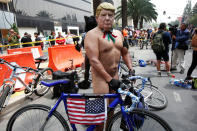 <p>A naked cyclist wears a mask depicting U.S. President Donald Trump during the World Naked Bike Ride in Mexico City, Mexico, June 10, 2017. (Photo: Ginnette Riquelme/Reuters) </p>