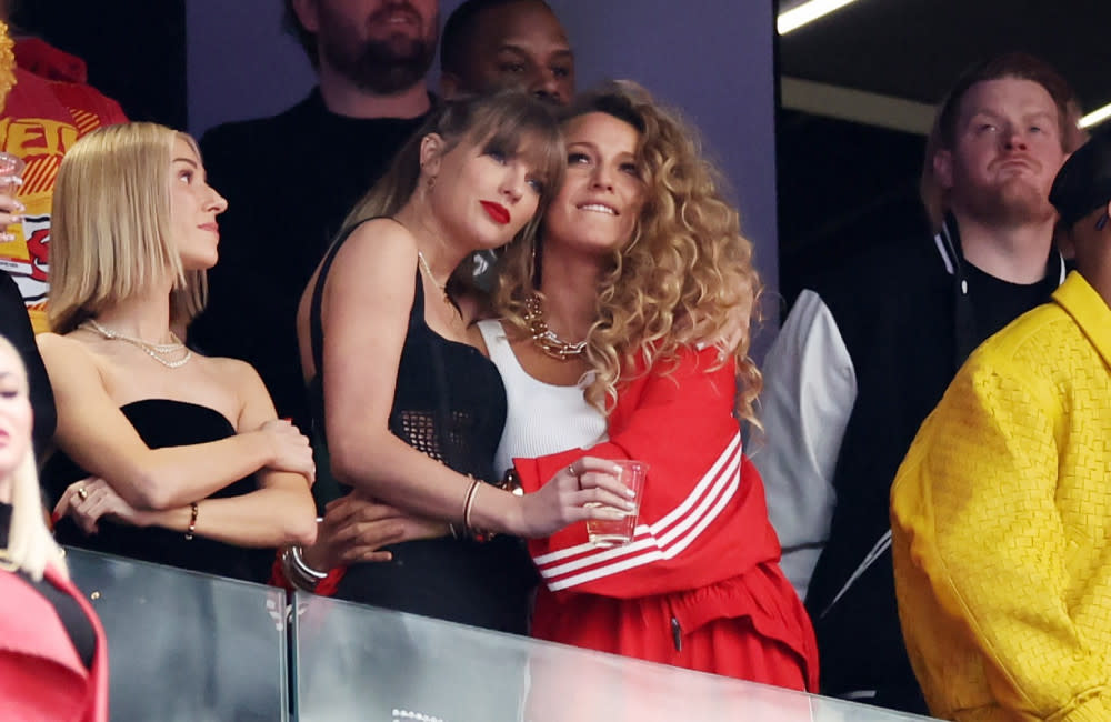 Taylor Swift and Actress Blake Lively hug prior to Super Bowl LVIII 2024 - Getty