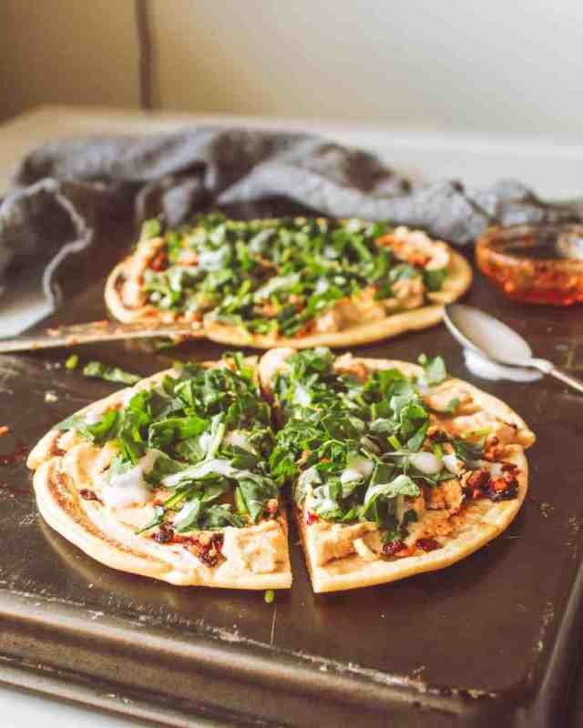 <p>Simple Fit Vegan</p><p>A quick healthy and spicy weeknight dinner.</p><p><strong>Get the recipe here: <a href="https://simplefitvegan.com/spicy-chili-crisp-pizza/" rel="nofollow noopener" target="_blank" data-ylk="slk:Spicy Chili Crisp Pizza;elm:context_link;itc:0;sec:content-canvas" class="link rapid-noclick-resp">Spicy Chili Crisp Pizza</a></strong></p>