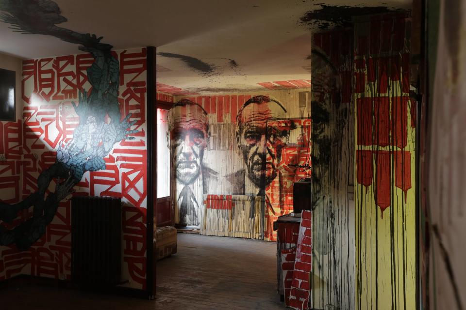 A living room painted by Italian street artist Orticanoodles is seen at the street art project tower "Paris Tour 13" in Paris