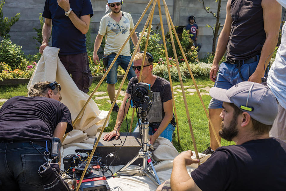 The Zone shoot employed multiple cameras to capture each scene from various angles. When possible, Zal and Oddy hid cameras from view, sticking one in a toy teepee set up for a garden party.