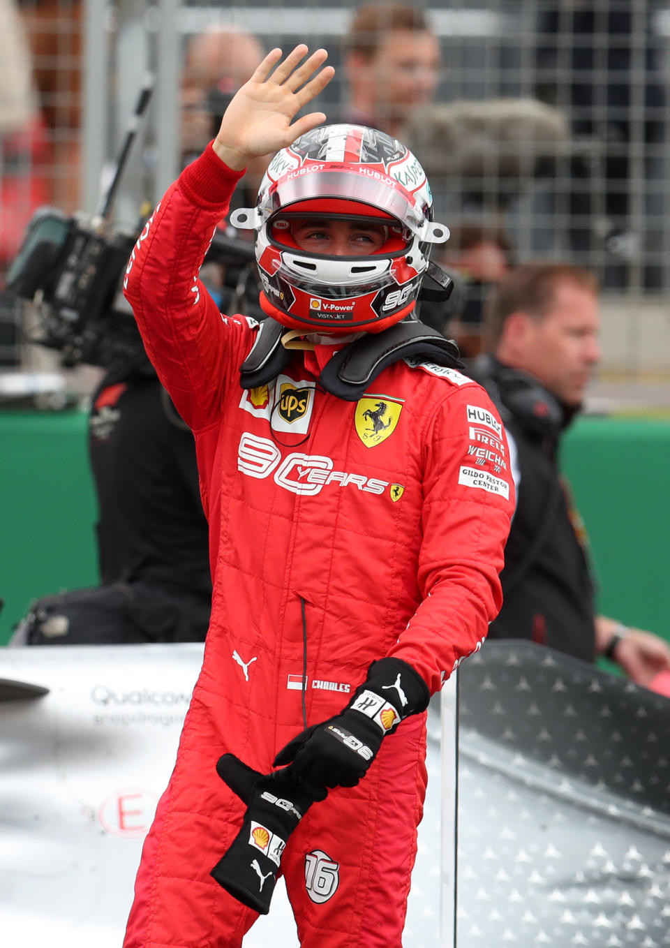 Ferrari driver Charles Leclerc waves to the crowd during qualifying for the British Grand Prix at Silverstone, Towcester. (Photo by Bradley Collyer/PA Images via Getty Images)