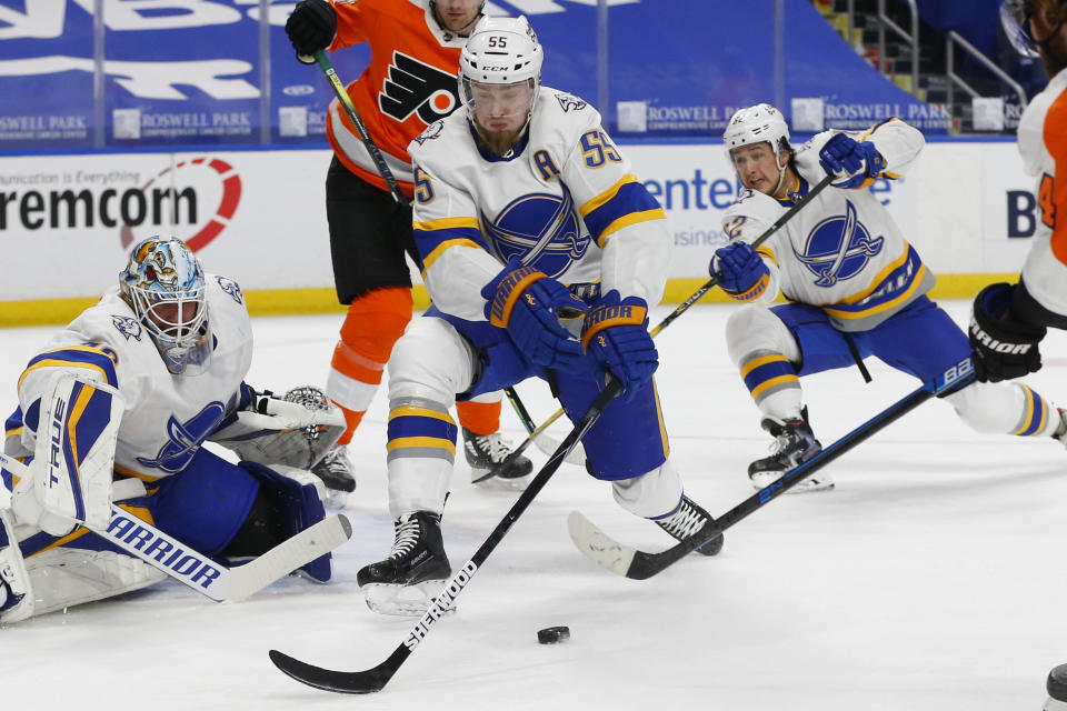 Buffalo Sabres defenseman Rasmus Ristolainen (55) blocks a shot during the first period of an NHL hockey game against the Philadelphia Flyers, Saturday, Feb. 27, 2021, in Buffalo, N.Y. (AP Photo/Jeffrey T. Barnes)