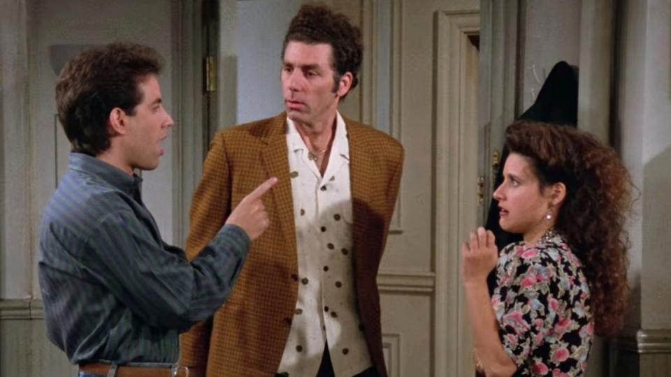 Jerry Seinfeld as himself, Michael Richards as Cosmo Kramer and Julia Louis-Dreyfus as Elaine Benes in "Seinfeld"<p>NBC</p>